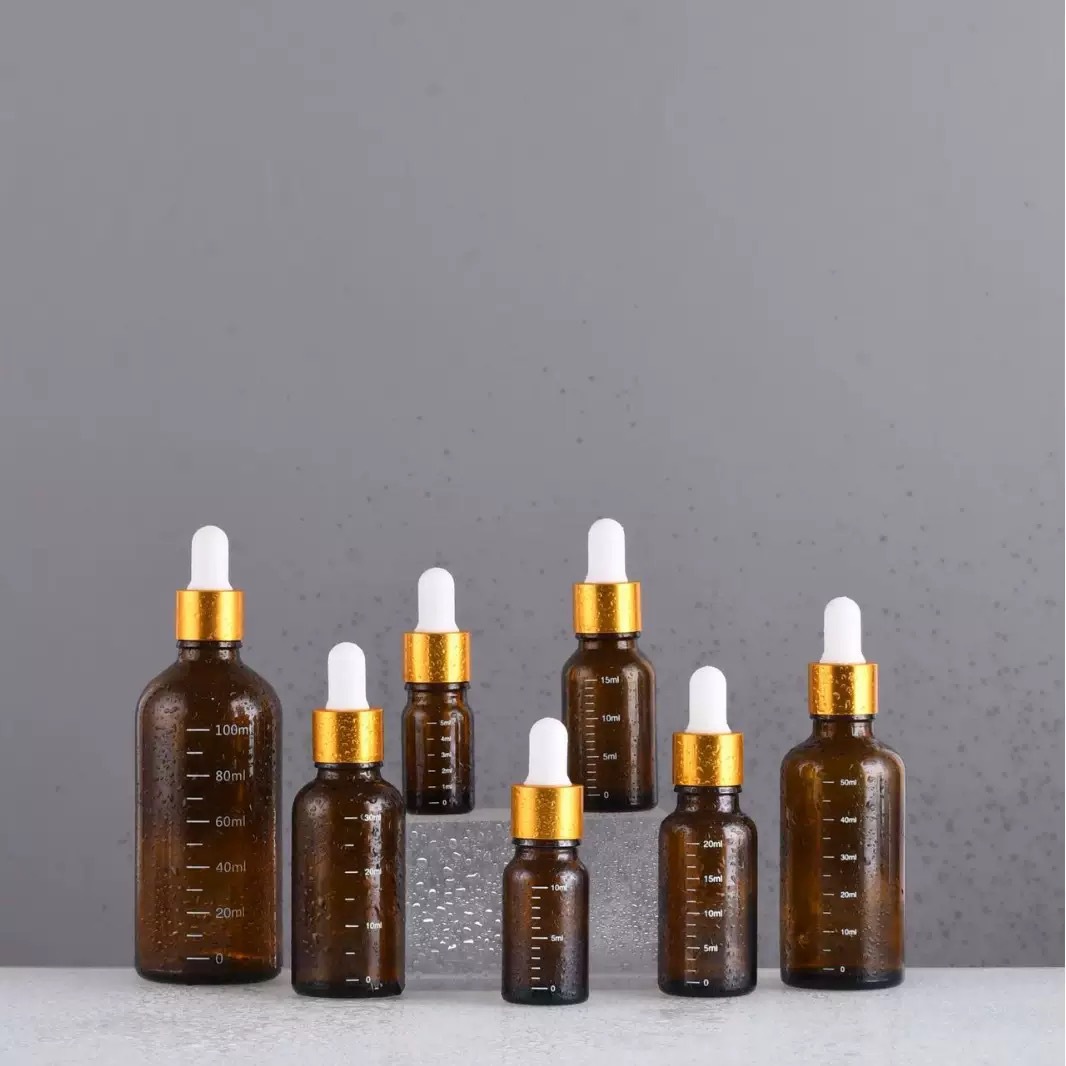 Amber glass dropper bottles in multiple sizes
